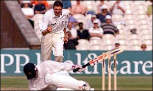 Steve Harmison bowls Warren Hegg
