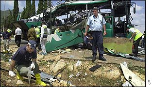 Bus wreck and workers