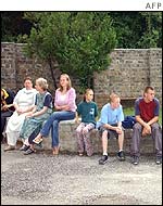 Staff and pupils at the school following the attack