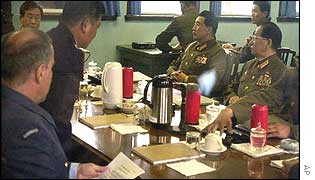 North Korean Army delegates, including Yi Chong-bok (right) talk with the United Nations Command 
