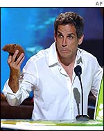 Actor Ben Stiller holds up the coconut shell announcing his award for Choice Movie Hissy Fit for his role in the film Zoolander, at the Teen Choice Awards 2002 
