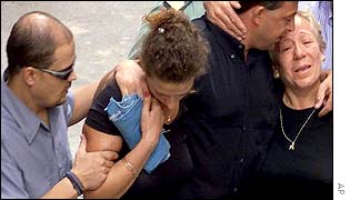 Relatives of six-year-old victims attend her funeral