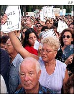 Crowd holding up anti-ETA leaflets