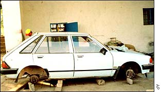 Abandoned car on farm
