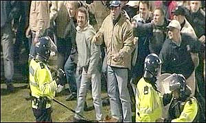 Supporters invade the pitch at a Cardiff City game
