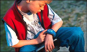 A boy with the GPS locator