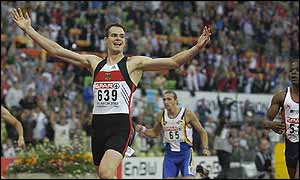 Ingo Schultz crosses the line to take gold