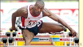 Colin Jackson eases through the first heat of the 110m hurdles, Tony Jarrett also qualifies