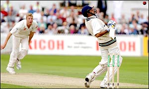 Flintoff sends in a short delivery forcing Laxman into evasive action