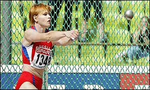 Russia's Kuzenkova, beat off competition from silver medallist Skolimowska, who threw 72.46
