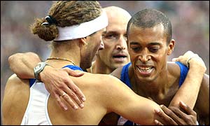 France's Stephane Diagana (right) celebrates victory in the 400m hurdles