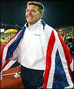 Steve Backley celebrates with the Union Jack flag