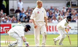 England's Matthew Hoggard (centre) looks on as India's Harbhajan Singh (left) and Zaheer Khan add runs
