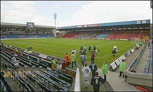 Thousands of empty seats welcome the Wimbledon and Gillingham players for the start of their Nationwide campaign
