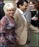 Barbara Windsor and her husband Scott Mitchell arrive for the wedding