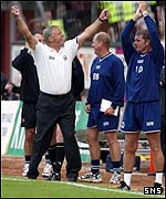 Jim Jefferies and his staff cheer on Killie
