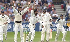 India celebrate after Nasser Hussain gifts 17-year-old Parthiv Patel his first Test wicket