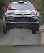 Colin McRae takes off during the Rally of Finland.
