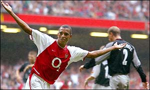 Arsenal's Brazilian matchwinner Gilberto Silva celebrates the only goal of the Community Shield in Cardiff