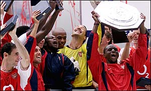Arsenal celebrate as Patrick Vieira lifts the Community Shield at Cardiff's Millennium Stadium