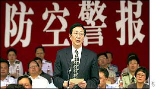 Shanghai Mayor Chen Liangyu makes a speech after the drill