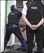 Police raid the mosque in the Midlands where the Ahmadi family were sheltering