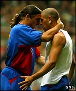 Rossi and Gimenez celebrate the early goal