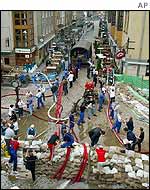 Workers erect sandbags in Dresden
