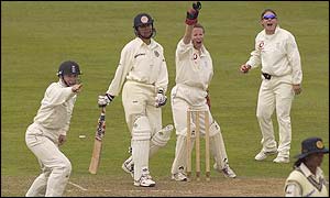 England appeal for the wicket of Anjum Chopra