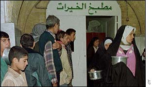 Iraqis queue for food