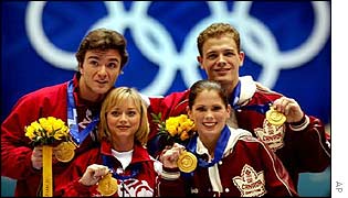 Elena Berezhnaya and Anton Sikharulidze of Russia and Jamie Sale and David Pelletier of Canada with gold medals following the Salt Lake City judging scandal 