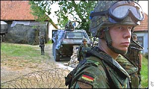 German soldier guarding peacekeepers' camp in Celebici