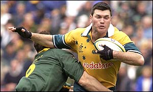 Daniel Herbert of Australia runs at South Africa