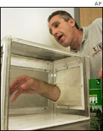Dr Jonathan Day of the University of Florida demonstrates the effects of insect repellent