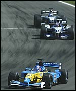 Jenson Button leads Juan Pablo Montoya and Kimi Raikkonen