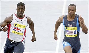 GB's Dwain Chambers (left) beats America's Coby Miller to gold