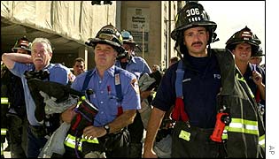 Firefighters working at the site of the Twin Towers