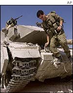 An Israeli soldier on an army tank