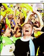 Residents of Wadowice greet the Pope as his plane flew several times over the city