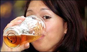 Woman drinking beer