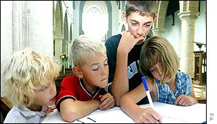 Children sign book of condolence