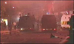 Police vehicles during the disturbances