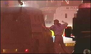 Police vehicles during the disturbances