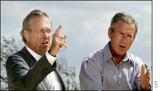 President Bush (R) and Defence Secretary Donald Rumsfeld