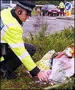 Flowers left near the girls' final resting place