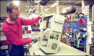 Factory worker assembling products