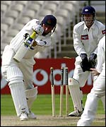 Blakey (right) watches former team-mate Byas bowled