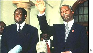 Robert Mugabe, left, with Thabo Mbeki, South Africa's president