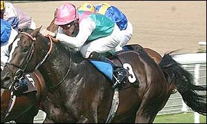 Richard Hughes, on Tillerman, moves up to win the Celebration Mile at Goodwood