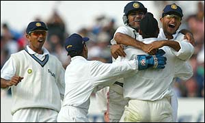 India celebrate a Harbhajan Singh wicket